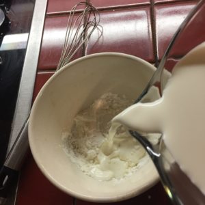 whisk small amount of cream into cornstarch